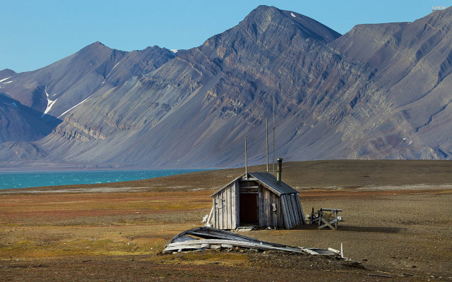 Small shack field mountains lake free wallpaper - medium preview image