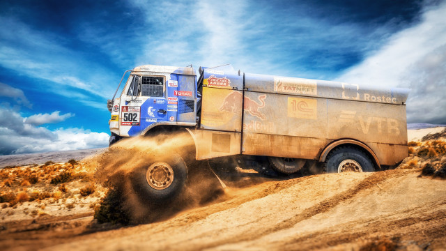 Truck desert mountains cloudy sky free wallpaper - medium preview image