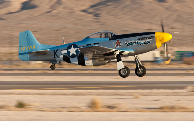 Blue yellow airplane desert mountains free wallpaper - medium preview image