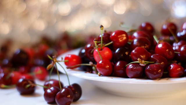 White plate cherries bokeh food free wallpaper - medium preview image