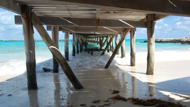 Pier boat beach waves ecological free wallpaper - medium preview image