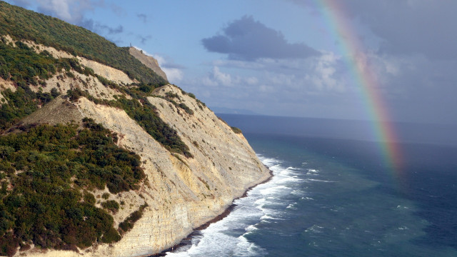 Rainbow ocean cliff beach mountain #2 free wallpaper - medium preview image