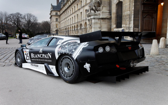 Car large rear clocktower building free wallpaper - medium preview image