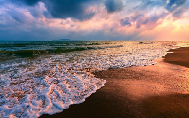 Beach waves cloudy sunset cityscape free wallpaper - medium preview image