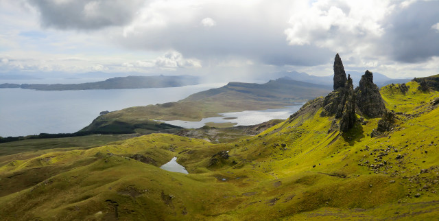 Grassy hill lake mountains clouds free wallpaper - medium preview image