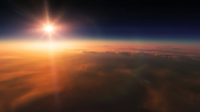 Sunrise over ocean mountain sky free wallpaper - medium preview image