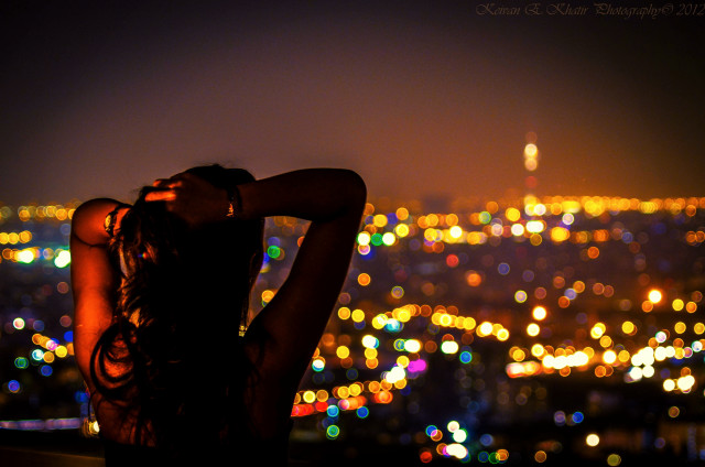 Woman city night christmas glowing free wallpaper - medium preview image