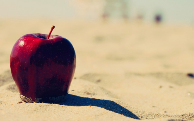 Red apple beach sand shadows free wallpaper - medium preview image