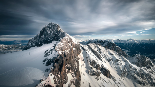 Snowy mountain city lake beach free wallpaper - medium preview image
