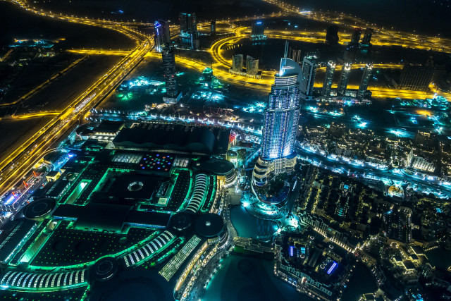 Cityscape clocktower neonlights tiltshift night free wallpaper - medium preview image