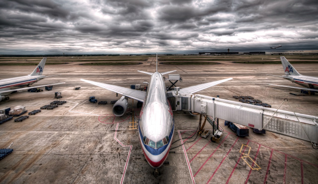 Large jetliner tarmac cloudy sky free wallpaper - medium preview image