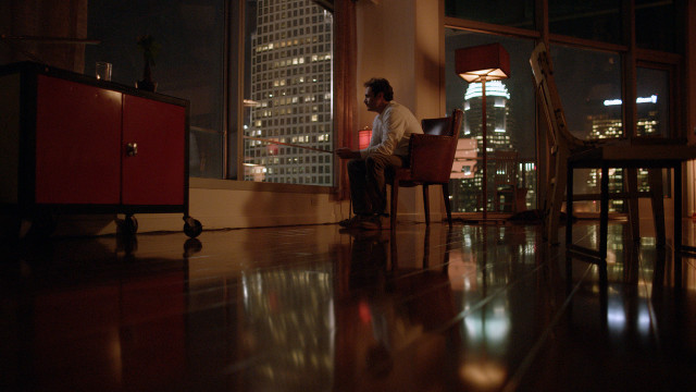 Man chair cityview night redcabinet free wallpaper - medium preview image