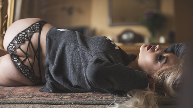 Woman laying on rug blonde free wallpaper - medium preview image