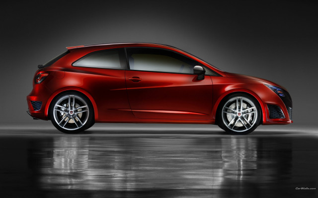 Red car dark room reflective free wallpaper - medium preview image