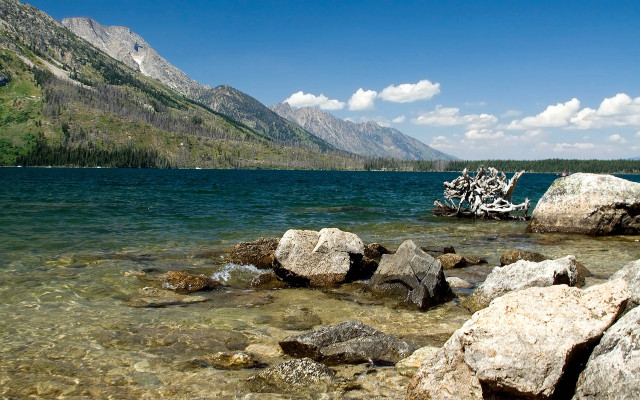 Lake shore mountains rocks boat free wallpaper - medium preview image