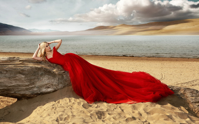 Woman red dress beach rock free wallpaper for desktop - medium preview image
