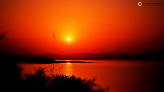 Sunset waterboat lighthouse autumn matte free wallpaper - medium preview image