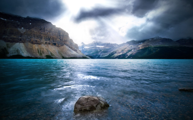 Large rock lake mountains cloudy free wallpaper - medium preview image