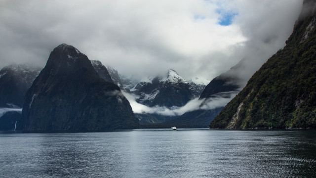 Boat mountains clouds water nature free wallpaper - medium preview image
