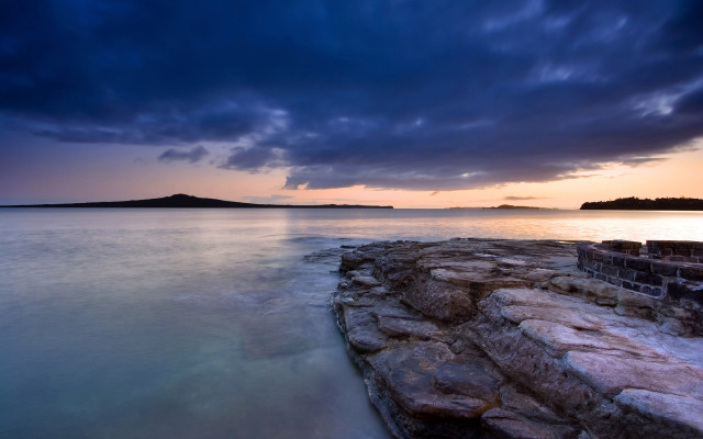 Rocky shore island cloudy sky free wallpaper - medium preview image