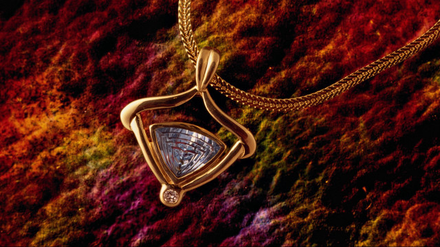 Gold necklace triangular pendant colorful free wallpaper - medium preview image