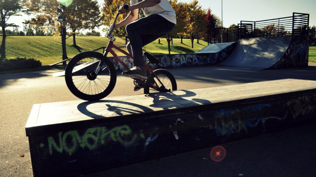Man bike wooden ramp graffiti free wallpaper - medium preview image