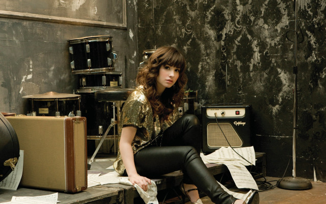 Woman sitting suitcase recordplayer room free wallpaper - medium preview image