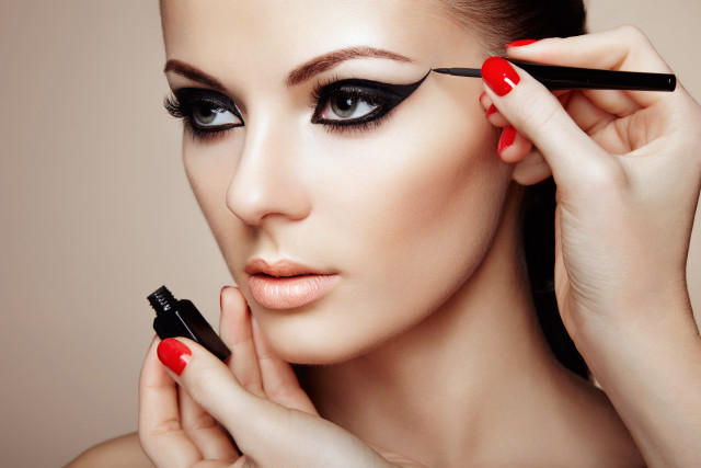 Woman red nails black eyeliner free wallpaper - medium preview image