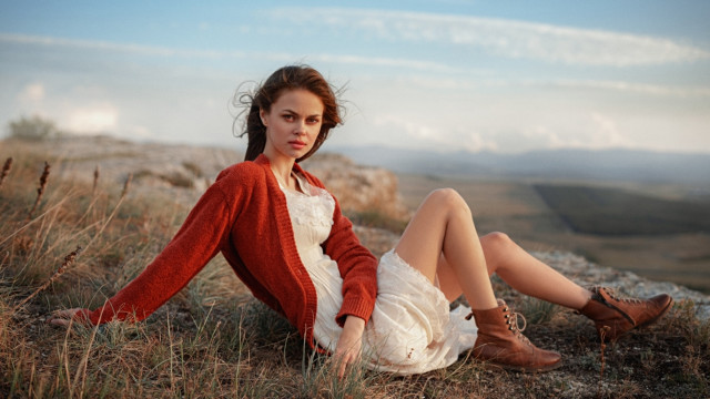 Woman hill sitting boots dress free wallpaper - medium preview image