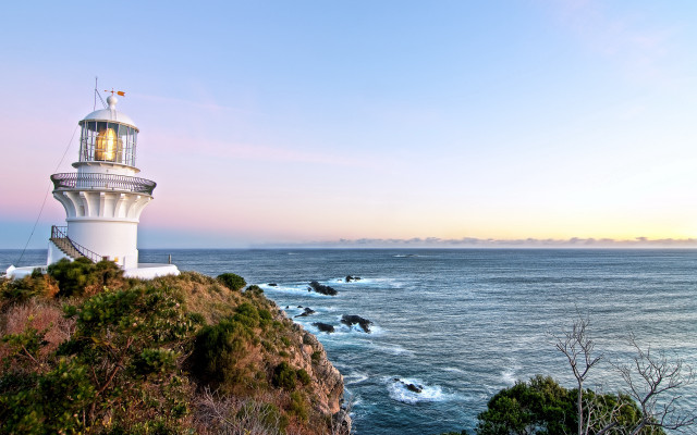 Lighthouse cliff ocean sunset brightlight free wallpaper - medium preview image