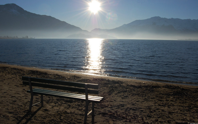 Beach bench mountains ocean sunlight free wallpaper - medium preview image