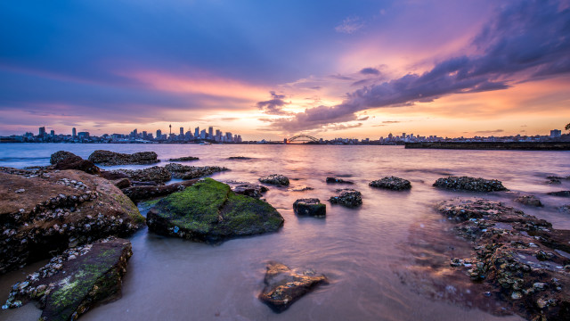 Sunset city water rocks dusk free wallpaper - medium preview image