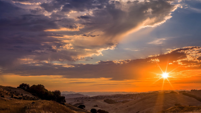 Sunset hilly landscape cows crepuscular free wallpaper - medium preview image
