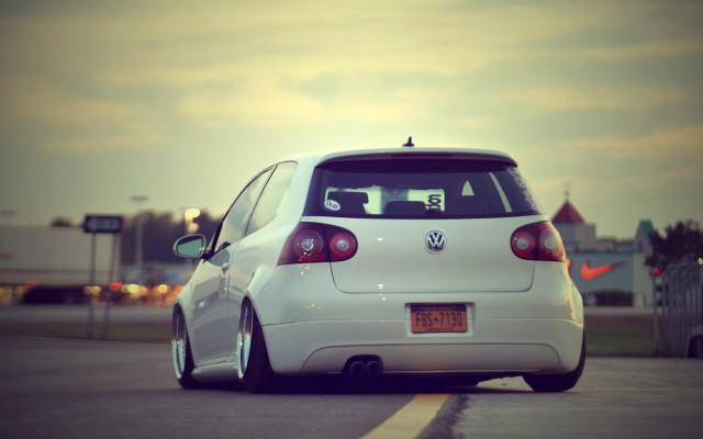 White car parked hood up free wallpaper - medium preview image