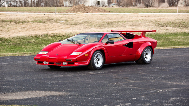 Red sports car road grass free wallpaper - medium preview image