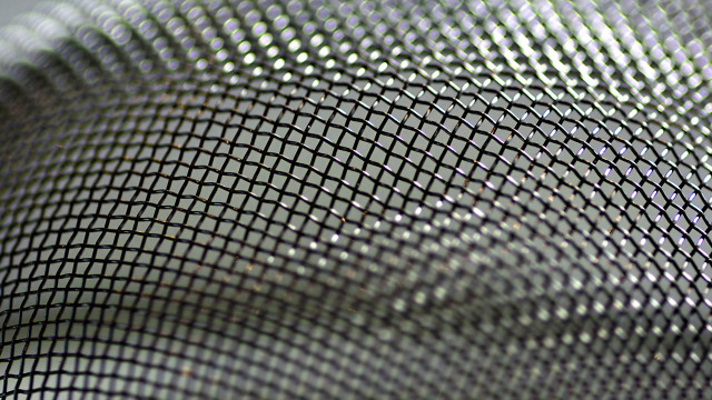 Metal mesh honeycomb blurry background free wallpaper - medium preview image