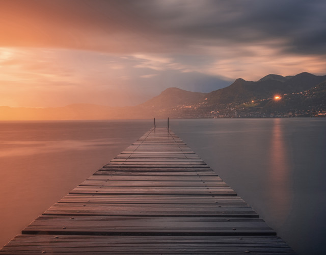 Docked mountains sunset reflection city free wallpaper - medium preview image