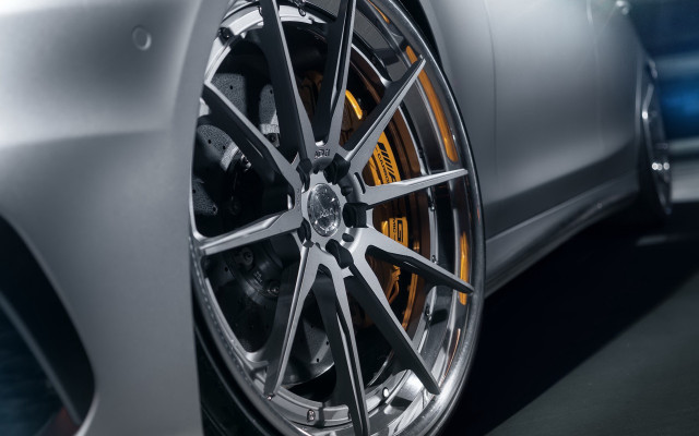 Car wheel closeup blue background free wallpaper - medium preview image