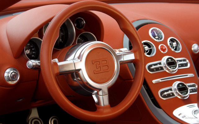 Red car dashboard steering wheel free wallpaper - medium preview image
