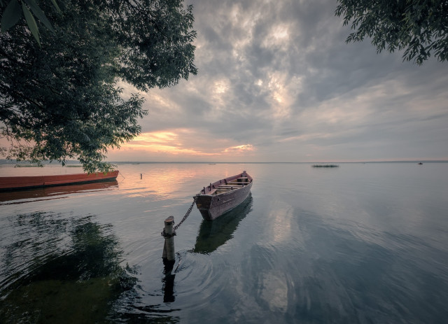 Man water boat cloudy sky free wallpaper - medium preview image