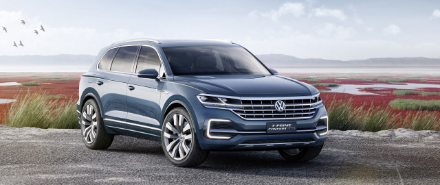 Blue volkswagen suv gravel road free wallpaper - medium preview image