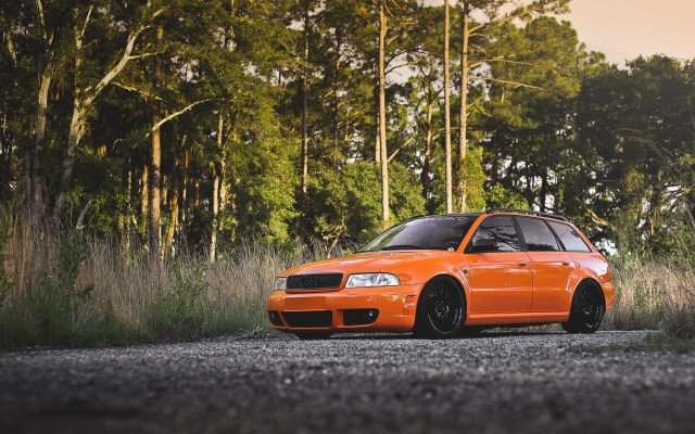 Orange car forest gravel road free wallpaper - medium preview image