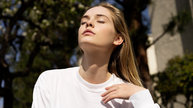 Woman white shirt tree building #2 free wallpaper - medium preview image