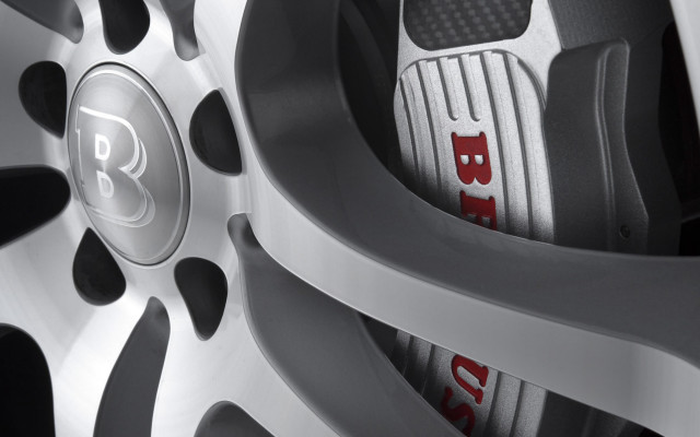 Tire closeup red lettering black free wallpaper - medium preview image