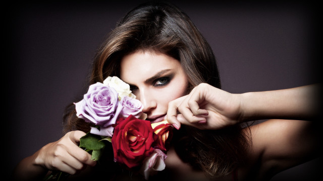 Woman holding flowers roses pink free wallpaper - medium preview image