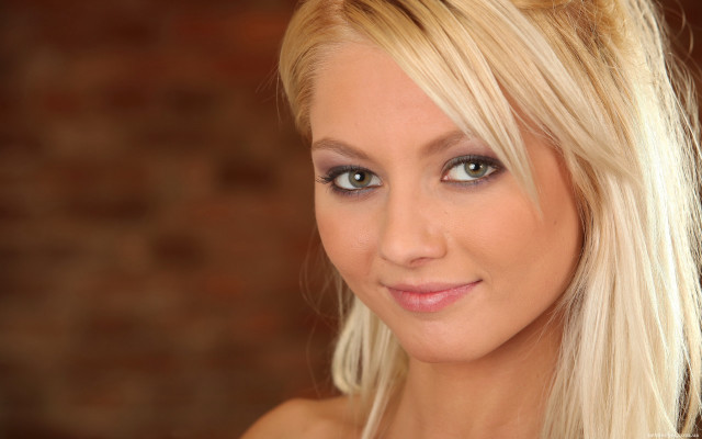 Blonde woman blue eyes brick free wallpaper - medium preview image
