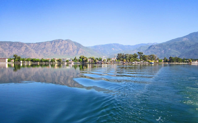 Lake mountains town shore reflection free wallpaper - medium preview image