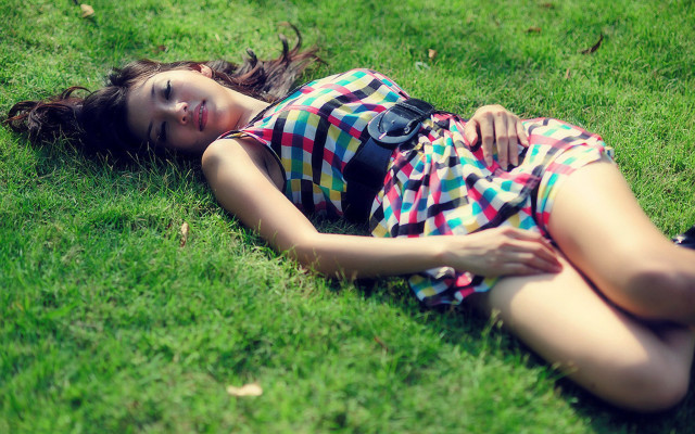 Woman laying on grass nature free wallpaper - medium preview image