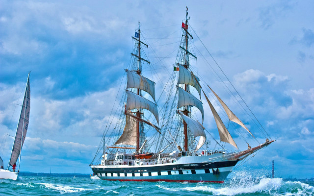 Large sailboat ocean cloudy day free wallpaper - medium preview image
