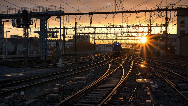 Train sunset cityscape fence lens free wallpaper - medium preview image